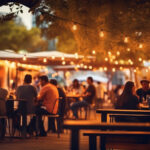 AI:lla luotu kuva jossa illanhämyssä istuu asiakkaita nauttimassa ravintolan terasseista ja valoista