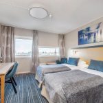 Anker hotellin standard-luokan huone erillisillä vuoteilla