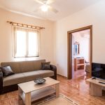 Perhehuoneiston olohuone