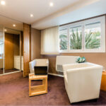 Hotel Helioksen Club Comfort -huoneluokan istuinryhmä