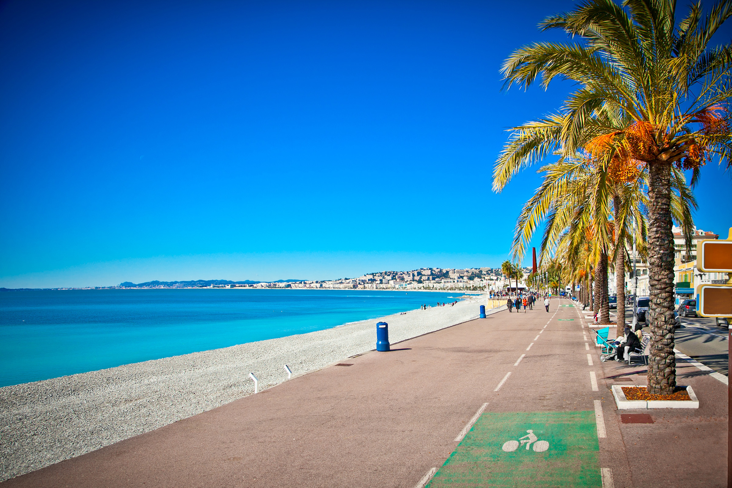 Promenade des Anglais in Nice, France. Nice is a popular Mediterranean tourist destination, attracting 4 million visitors each year.
